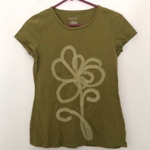 Green short sleeve top with floral design